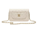 Chanel | Classic Flap Bag In Quilted White Lambskin Leather.