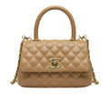 Chanel | Mini Coco Handle Flap Bag In Caramel/beige Caviar Leather.